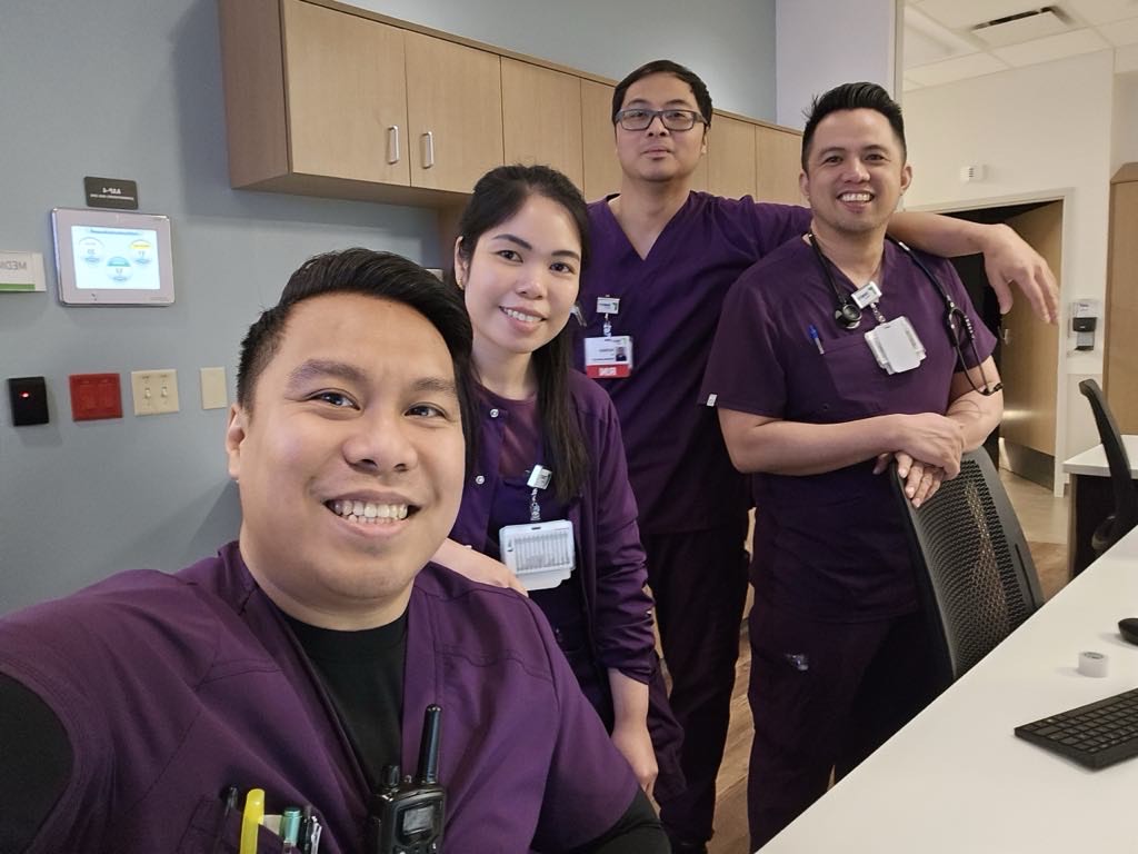 Greendoor nurses in scrubs together at their hospital unit